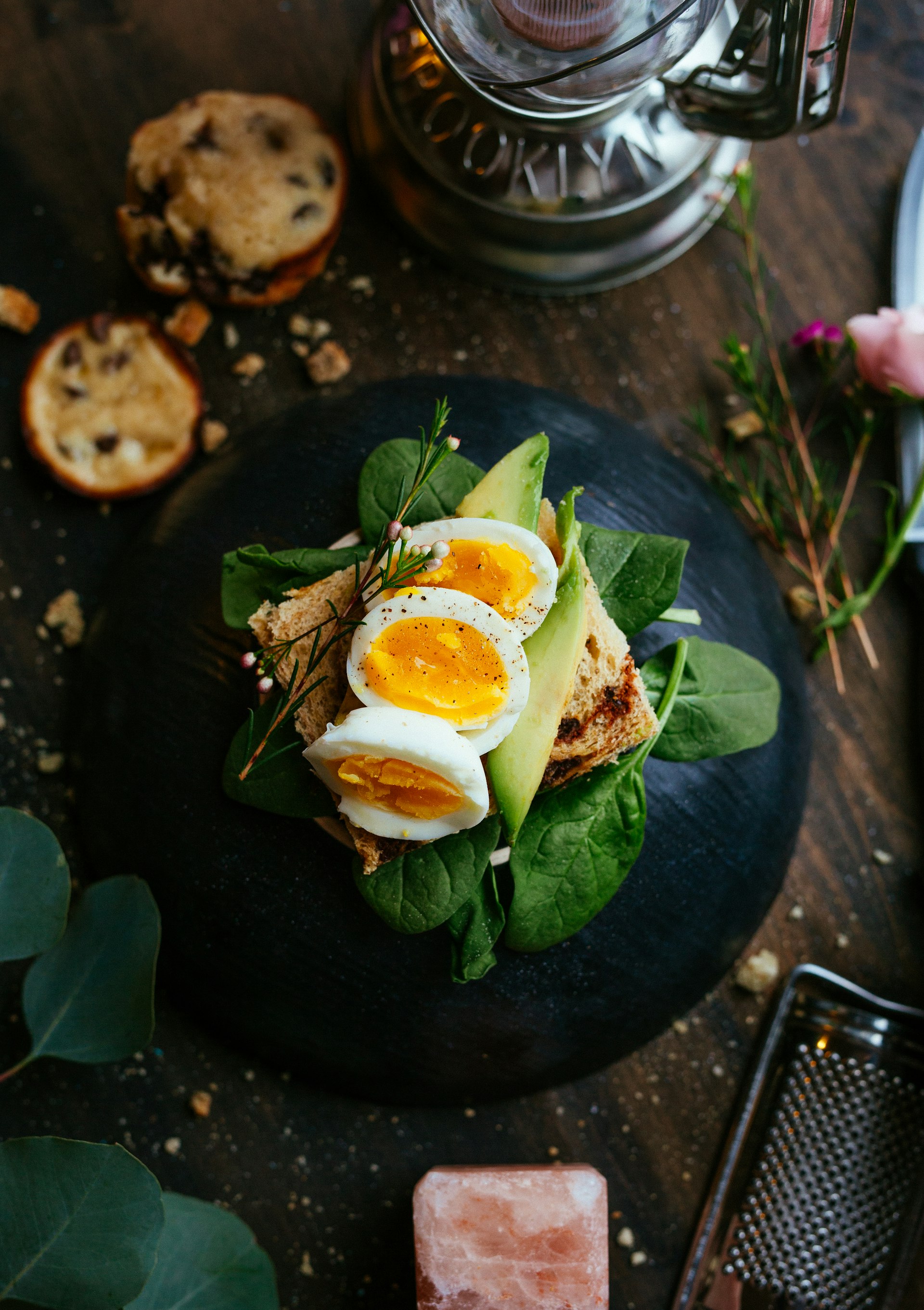 close up of a beautiful healthy dish on a bright table setting, morning light, olive oil details, photorealistic, cinematic food styling